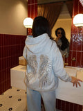 Melek Parıltılı Taş Detaylı Oversize Sweatshirt